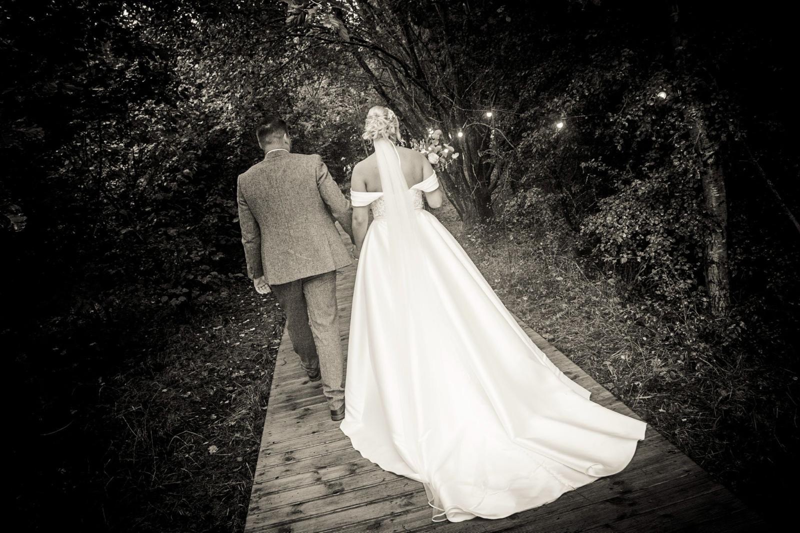 A couple sharing a quiet moment after their wedding ceremony.